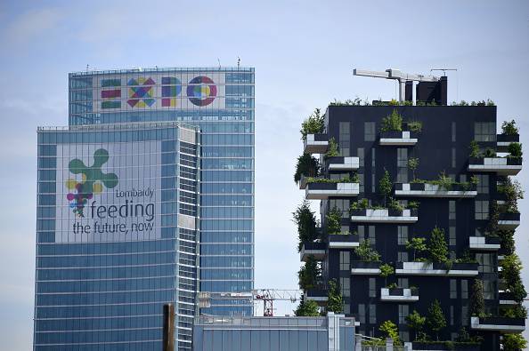 A picture shows the Lombardia Region building advertising EXPO2015 on April 28, 2015 in Milan where the World Exposition Milano 2015 (Universal Exposition) will run from May 1st, 2015 to October 31, 2015 on the theme Feeding the Planet, Energy for Life. The fair focuses on food security, sustainable agricultural practices, nutrition and battling hunger - as well as on dishing out the best fare of the world's culinary cultures. Cooking shows, restaurants, and food stalls will be designed to attract and hold visitors in Italy's financial capital. AFP PHOTO / OLIVIER MORIN        (Photo credit should read OLIVIER MORIN/AFP/Getty Images)