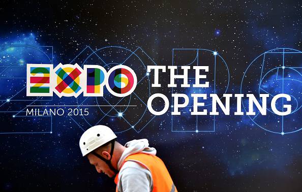 A worker works to finish preparations for the Universal Exposition Milano 2015, EXPO2015, on April 29, 2015 in Milan. The exposition will run from May 1st, 2015 to October 31, 2015 on the theme of Feeding the Planet, Energy for Life. The fair focuses on food security, sustainable agricultural practices, nutrition and battling hunger - as well as dishing out the best fare of the world's culinary cultures. Cooking shows, restaurants, and food stalls will be designed to attract and hold visitors in Italy's financial capital. AFP PHOTO / OLIVIER MORIN        (Photo credit should read OLIVIER MORIN/AFP/Getty Images)