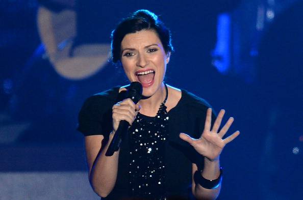 Laura Pausini performs on stage at the 2013 Latin Recording Academy Person of the Year Tribute Gala, November 20, 2013 at the Mandalay Bay Resort and Casino in Las Vegas, Nevada. The 2013 Latin Recording Academy Person of the Year honoree is Spanish/Italian musician and actor Miguel Bose. AFP PHOTO / Robyn Beck (Photo credit should read ROBYN BECK/AFP/Getty Images)