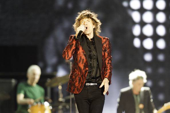 ABU DHABI, UNITED ARAB EMIRATES - FEBRUARY 21:  Mick Jagger of The Rolling Stones performs at du Arena, Yas Island on February 21, 2014 in Abu Dhabi, United Arab Emirates.  (Photo by Neville Hopwood/Getty Images)