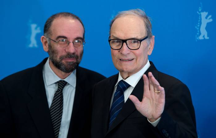 Italian composer Ennio Morricone (R) and Italian diector Giuseppe Tornatore pose for photographers during a photocall for the film 'The Best Offer' shown in the "Berlinale Special" section of the 63rd Berlinale Film Festival in Berlin February 12, 2013.   AFP PHOTO / JOHANNES EISELE        (Photo credit should read JOHANNES EISELE/AFP/Getty Images)
