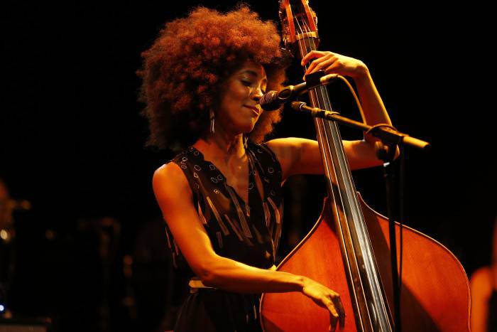 US jazz bassist and singer Esperanza Spalding performs on stage at the Nice Jazz Festival on July 12, 2013 in Nice, southeastern France. AFP PHOTO / VALERY HACHE        (Photo credit should read VALERY HACHE/AFP/Getty Images)