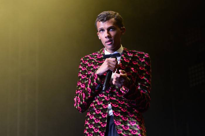 INDIO, CA - APRIL 12:  Singer/songwriter Stromae performs onstage during day 3 of the 2015 Coachella Valley Music & Arts Festival (Weekend 1) at the Empire Polo Club on April 12, 2015 in Indio, California.  (Photo by Jason Kempin/Getty Images for Coachella)