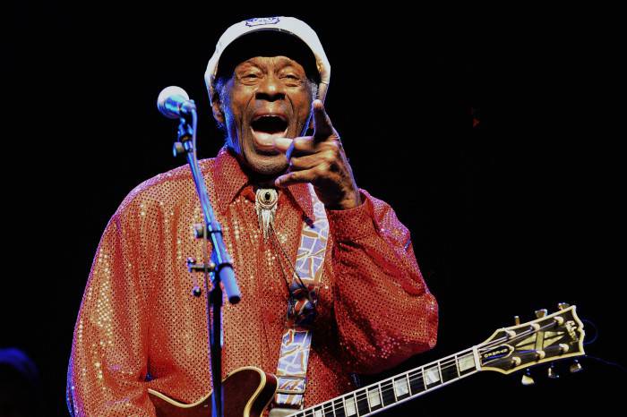 Legendary US singer and composer Chuck Berry, one of the pioneers of rock-and-roll, performs at a concert in Montevideo on April 15, 2013.  AFP PHOTO/Pablo PORCIUNCULA        (Photo credit should read PABLO PORCIUNCULA/AFP/Getty Images)