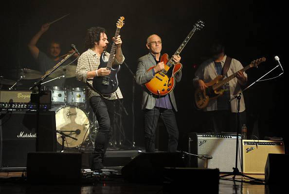 US guitarists Steve Lukather (centre L) and Larry Carlton (centre R) perform at the last show of their 2015 Asian tour, at the AC Hall in Hong Kong on February 5, 2015. Lukather, known for his work with the US rock group Toto in the 1980s, and multi-Grammy Award winning Carlton, appeared together as part of the Jazz World Live Series.    AFP PHOTO / RICHARD A. BROOKS        (Photo credit should read RICHARD A. BROOKS/AFP/Getty Images)