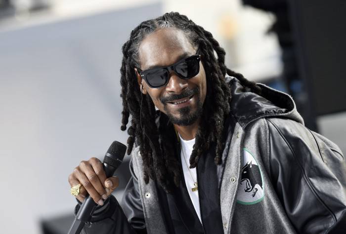 US rapper Snoop Dogg takes part in the Grand Journal tv show, on the sidelines of the 68th Cannes Film Festival in Cannes, southeastern France, on May 19, 2015. AFP PHOTO / LOIC VENANCE        (Photo credit should read LOIC VENANCE/AFP/Getty Images)