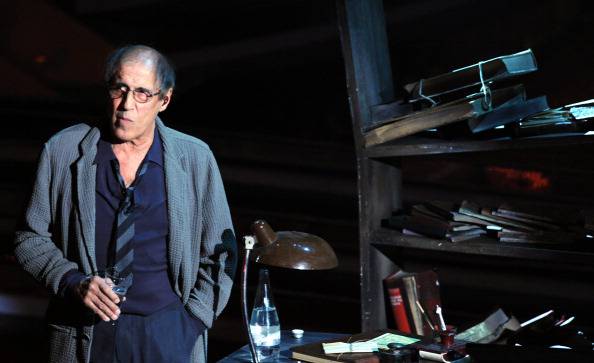 Italian actor-singer Adriano Celentano performs on the stage of Ariston Theatre in Sanremo, during the 62th Italian Music Festival on February 18, 2012. AFP PHOTO/ Tiziana Fabi (Photo credit should read TIZIANA FABI/AFP/Getty Images)