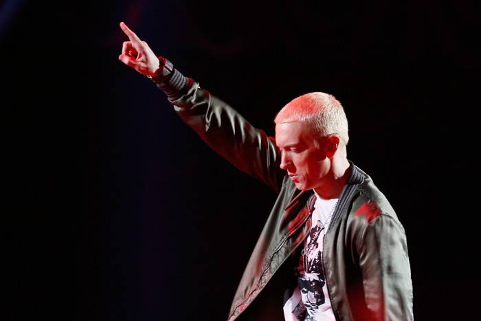 LOS ANGELES, CA - APRIL 13:  Recording artist Eminem performs onstage at the 2014 MTV Movie Awards at Nokia Theatre L.A. Live on April 13, 2014 in Los Angeles, California.  (Photo by Christopher Polk/Getty Images for MTV)