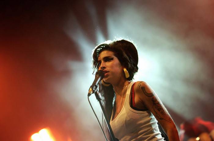 Belfort, FRANCE: British singer Amy Winehouse performs on stage, 29 June 2007 during the Eurockeennes Music Festival in Belfort, Eastern France. AFP PHOTO JEFF PACHOUD (Photo credit should read JEFF PACHOUD/AFP/Getty Images)