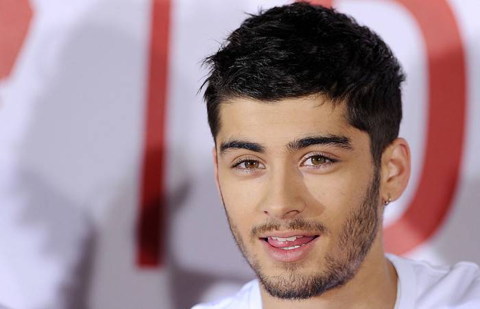 LONDON, UNITED KINGDOM - AUGUST 19: Zayn Malik of One Direction attends a photocall to launch their new film 'One Direction: This Is Us 3D' on August 19, 2013 in London, England. (Photo by Stuart C. Wilson/Getty Images)