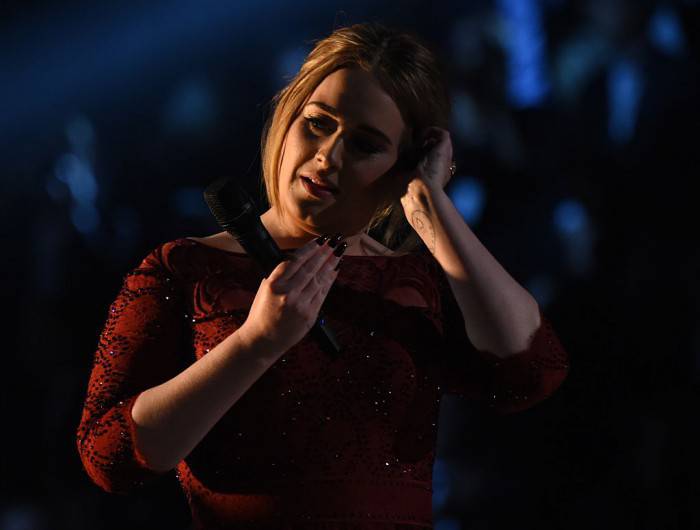 Singer Adele performs onstage during the 58th Annual Grammy music Awards in Los Angeles February 15, 2016.  AFP PHOTO/  ROBYN BECK / AFP / ROBYN BECK        (Photo credit should read ROBYN BECK/AFP/Getty Images)