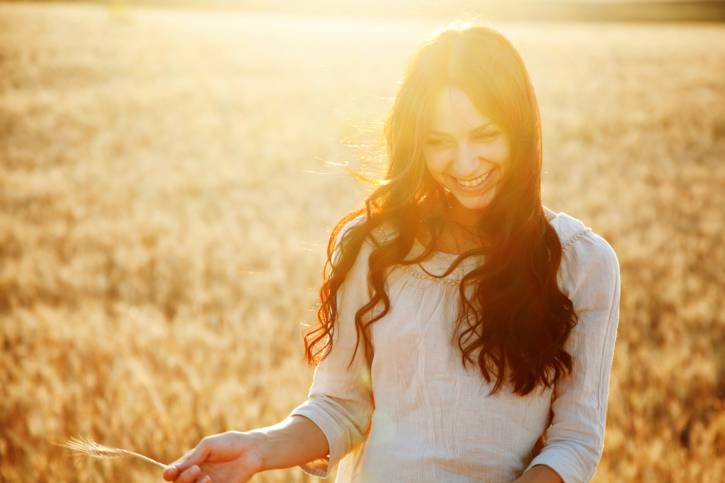 Beautiful lady in wheat field