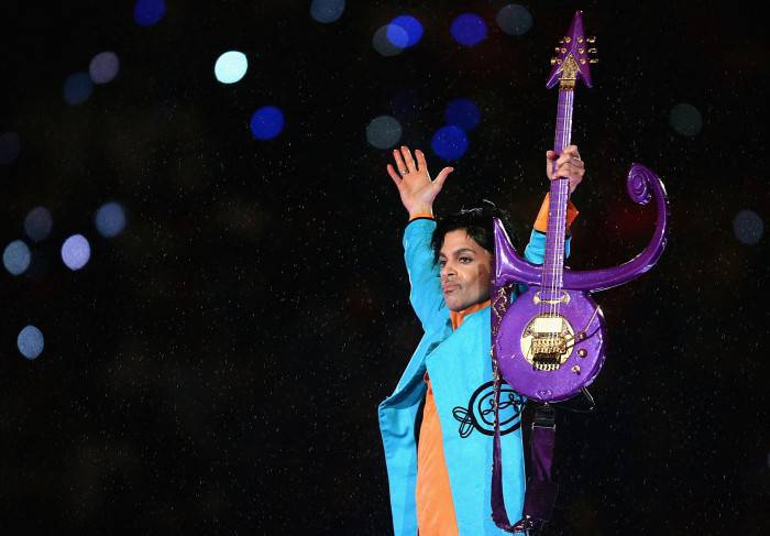 MIAMI GARDENS, FL - FEBRUARY 04:  Prince performs during the "Pepsi Halftime Show" at Super Bowl XLI between the Indianapolis Colts and the Chicago Bears on February 4, 2007 at Dolphin Stadium in Miami Gardens, Florida.  (Photo by Jonathan Daniel/Getty Images) *** Local Caption *** Prince