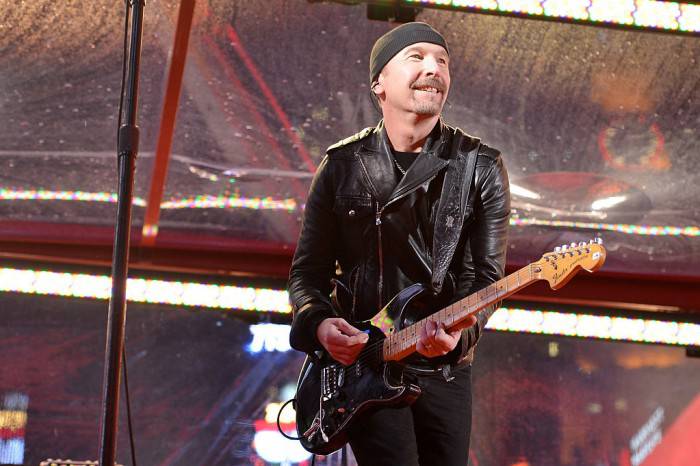 NEW YORK, NY - DECEMBER 01:  Guitarist The Edge of U2 performs on World AIDS Day at 'A (RED) Thank You,' presented by (Bank of America)RED on December 1, 2014 in New York City.  (Photo by Slaven Vlasic/Getty Images for (RED))