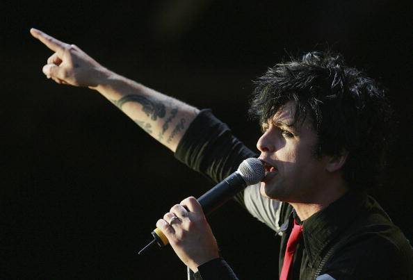 KINROSS, UNITED KINGDOM - JULY 10:  Billie Joe Armstrong of Greenday performs on stage at ?T In The Park 2005? at Balado on July 10, 2005 at Kinross, Scotland.  (Photo by Christopher Furlong/Getty Images)