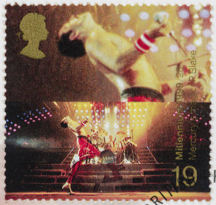 "Sacramento, California, USA - October 4, 2012: A 1999 UK postage stamp with a photo of Freddie Mercury (1946 - 1991) from the rock band Queen. Issued as part of the Millennium stamp series celebrating the 20th century."